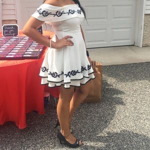Off-shoulder white and black dress